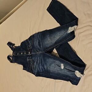 Distressed skinny overalls